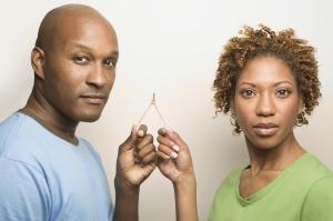African couple holding wishbone