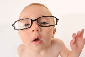 white-baby-with-reading-glasses